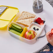 child with lunchbox - blue slate - b.box for kids