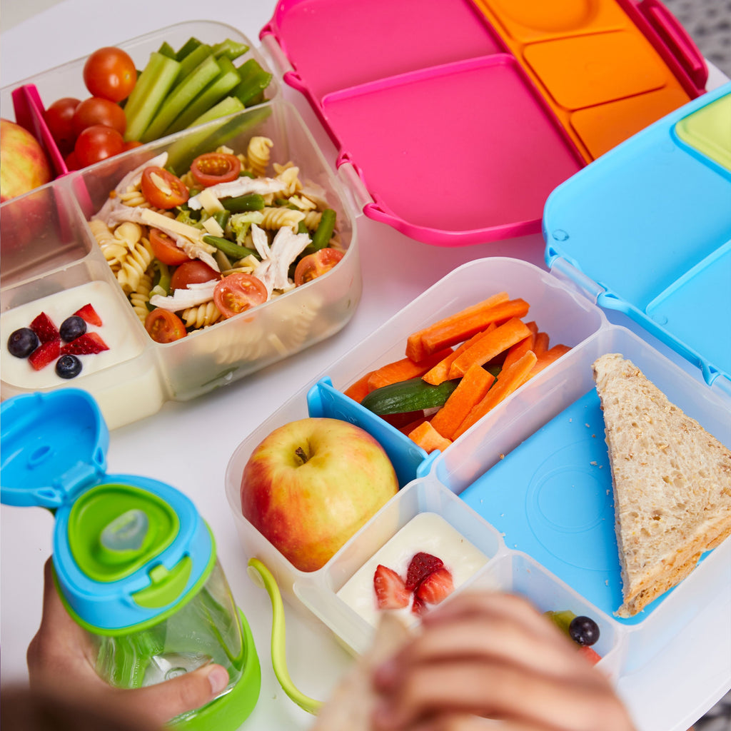 child with lunchbox - blue slate - b.box for kids