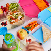 child with lunchbox - blue slate - b.box for kids