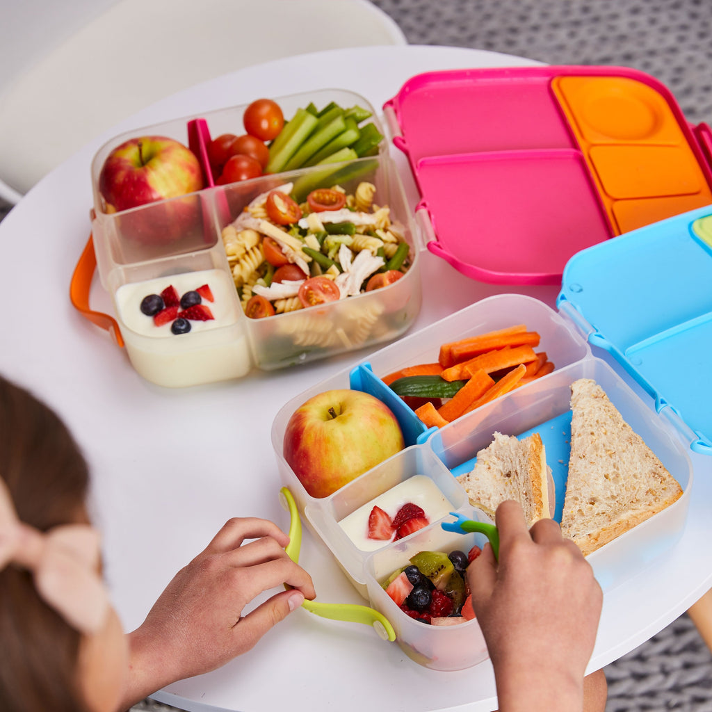 child with lunchbox - blue slate - b.box for kids
